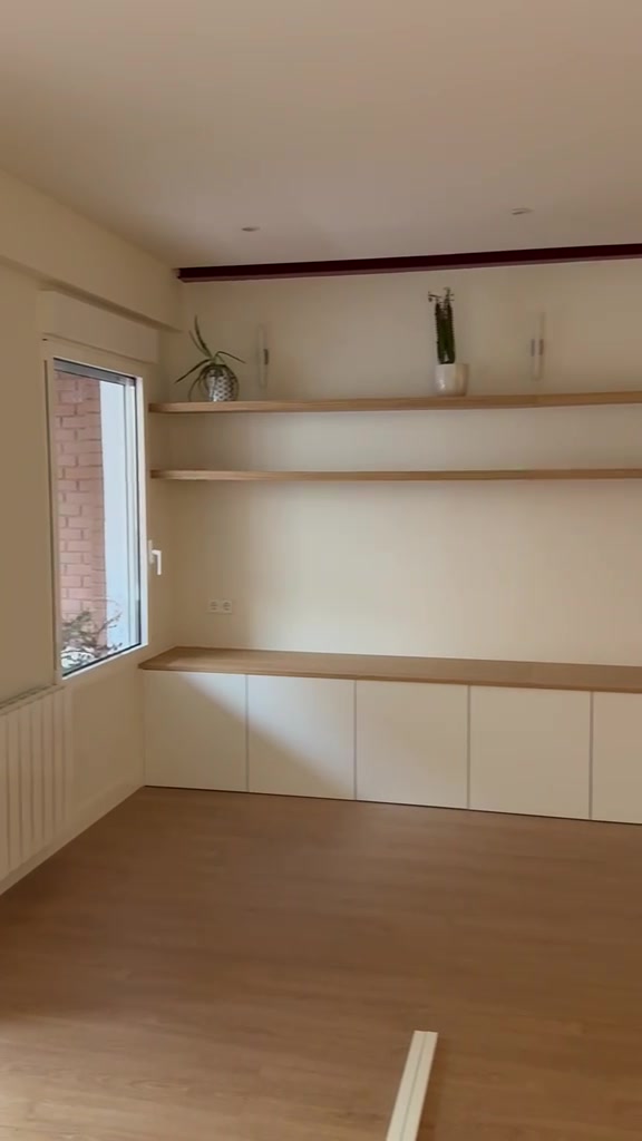 Salón con mueble bajo a medida